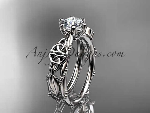 14kt white gold celtic trinity knot engagement ring , wedding ring with a "Forever One" Moissanite center stone CT766