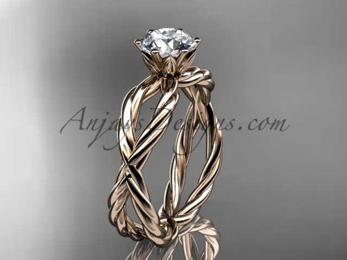 14k rose gold rope engagement ring with a "Forever One" Moissanite center stone RP870