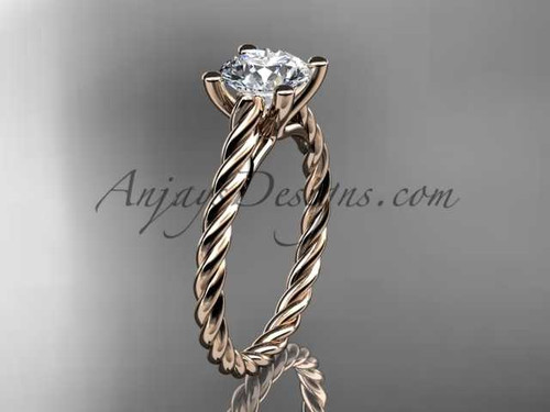 14kt rose gold twisted rope wedding ring with a "Forever One" Moissanite center stone RP8116 14kt rose gold twisted rope wedding ring with a "Forever One" Moissanite center stone RP8116
