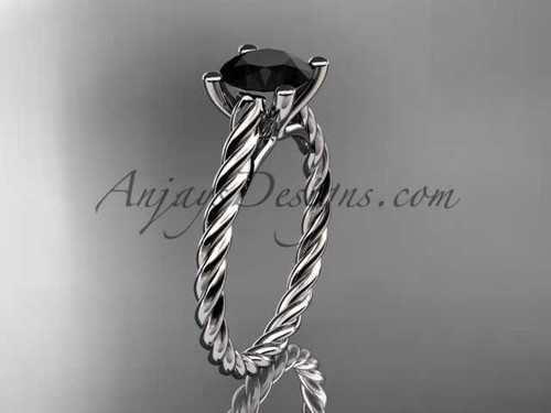 14kt white gold twisted rope wedding ring with a Black Diamond center stone RP8116