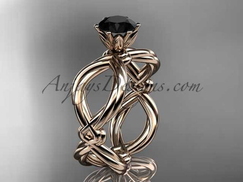 14kt rose gold twisted rope engagement ring with a Black Diamond center stone RP8192