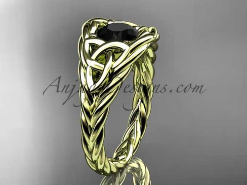 14kt yellow gold celtic trinity rope wedding ring with a Black Diamond center stone RPCT964 14kt yellow gold celtic trinity rope wedding ring with a Black Diamond center stone RPCT964