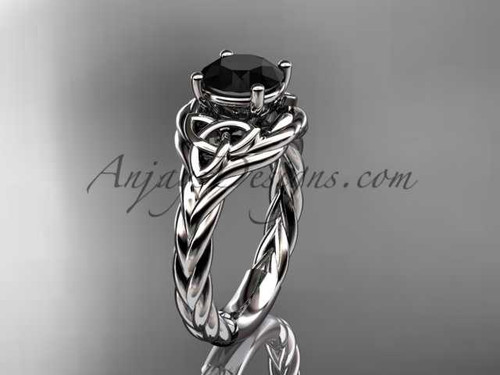 Platinum celtic trinity twisted rope wedding ring with a Black Diamond center stone RPCT9125 Platinum celtic trinity twisted rope wedding ring with a Black Diamond center stone RPCT9125