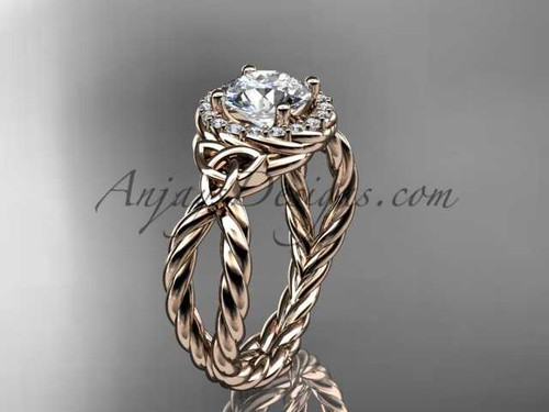 14kt rose gold rope halo celtic triquetra engagement ring with a "Forever One" Moissanite center stone RPCT9127