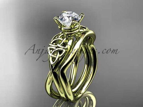 14kt yellow gold celtic trinity knot engagement set with a "Forever One" Moissanite center stone CT770S
