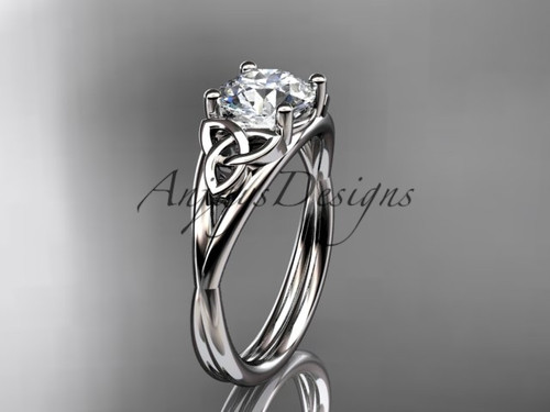 Delicate dainty Celtic engagement ring featuring IGI certified 1 carat round lab grown diamond in 14k white gold by Anjays Designs.