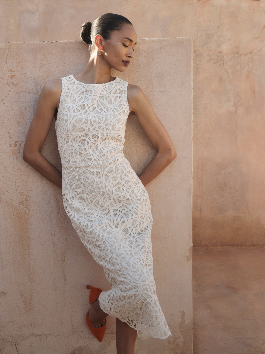 Model wearing ivory Valencia dress