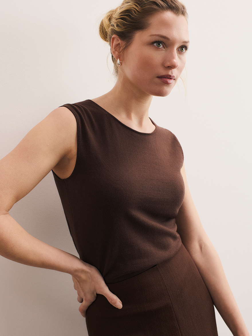 Model wearing chocolate top
