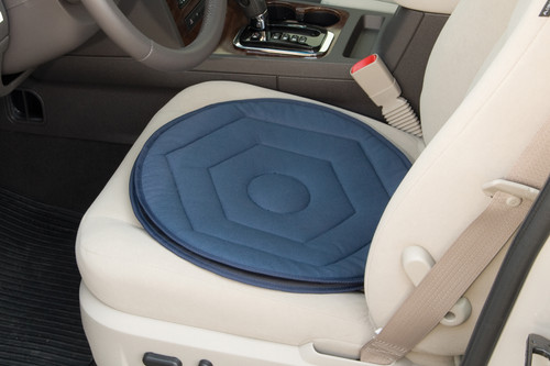 Blue swivel seat cushion in car.