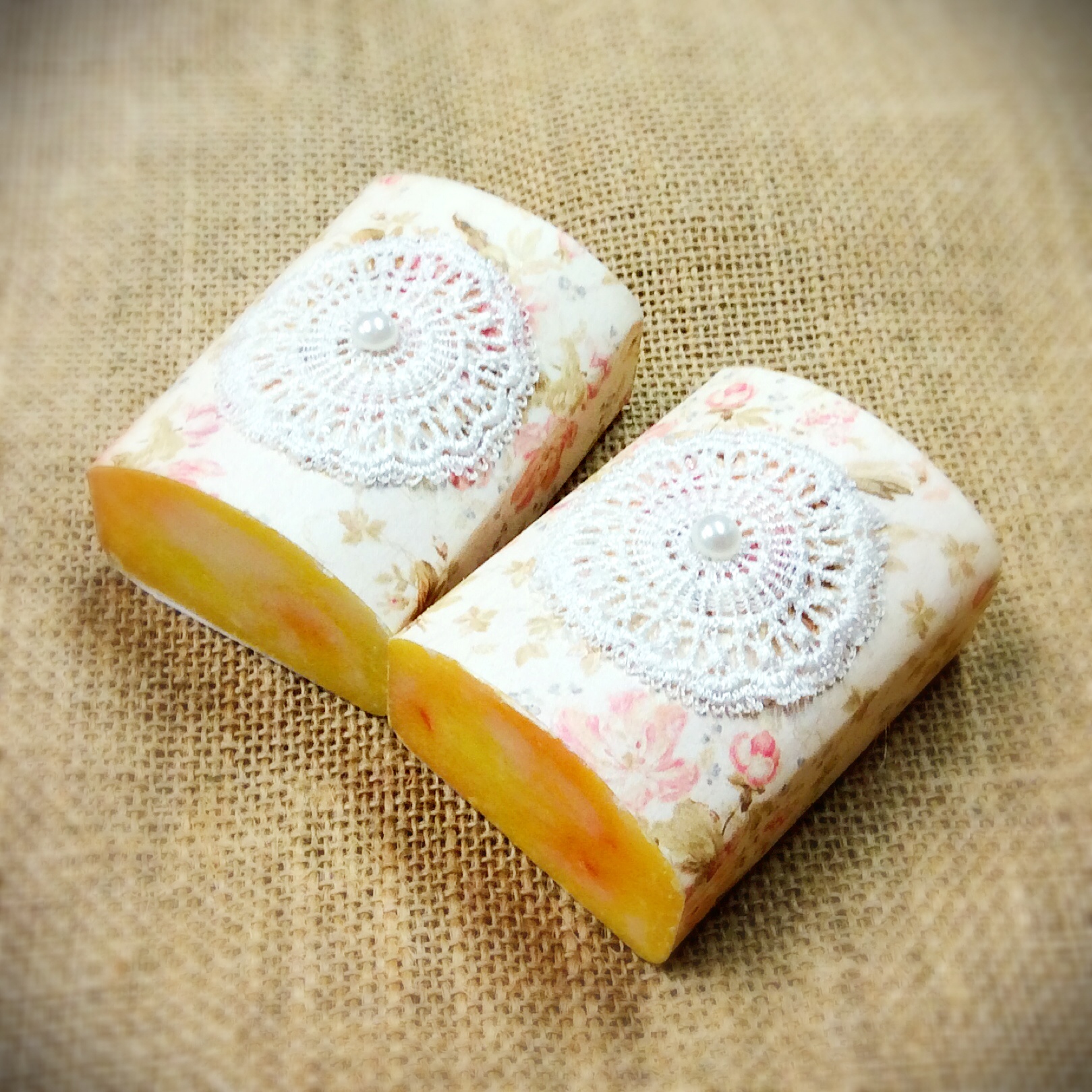 wedding-or-event-favor-of-1-large-goats-milk-soap-with-floral-print-paper-and-doily-on-top.jpg