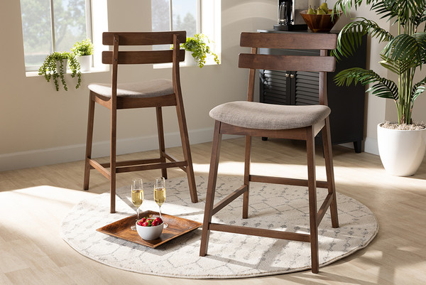 Baxton Studio Larine Modern And Contemporary Light Grey Fabric Upholstered Walnut Finished 2 Piece Wood Counter Stool Set Boba Light Grey Walnut Counter Stool By Wholesale Interiors