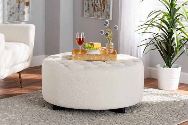 Baxton Studio Athena Modern And Contemporary Ivory Boucle Upholstered And Black Finished Wood Round Ottoman 2213 Beige Ottoman By Wholesale Interiors