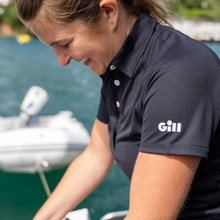 Women's UV Tec Polo - UV008W-BLK01-LIFESTYLE-2.jpg