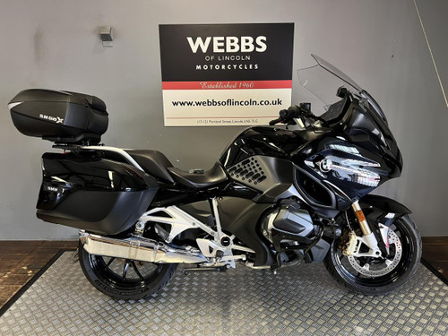 BMW R 1250 RT LE motorcycle, black touring bike with top case and side panniers at Webbs Motorcycles.