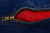 Venti ACE KEVLAR RIDING JEANS – BLUE, close-up of the pocket showing a red kevlar-embedded lining inside blue denim jeans with a brass zipper.