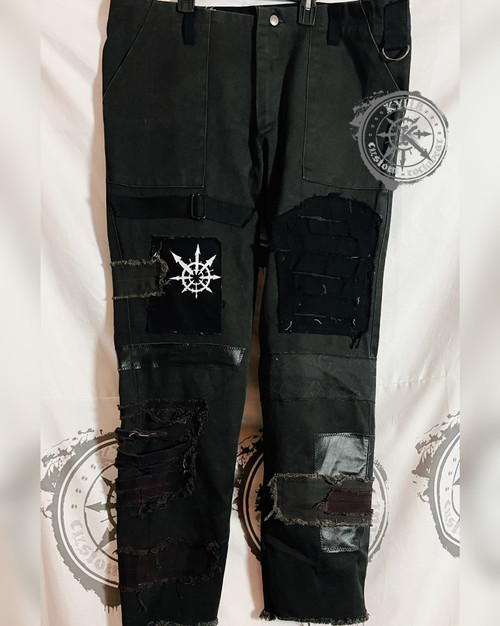 Deep olive green distressed denim and leather jeans size w40 ring jeans with knotwork and chaos patches