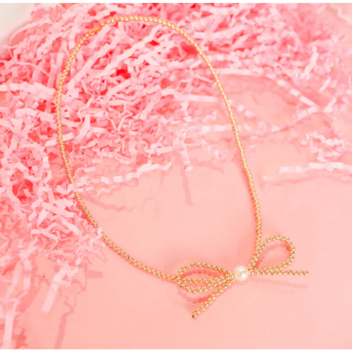 Beaded Blonde Gold Bow Necklace with Pearl Beaded Blonde Gold Bow Necklace with Pearl