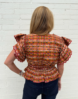 Terra Peplum Flutter Blouse