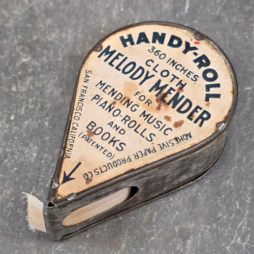 Handy-Roll Antique Melody Mender Advertising Tin Cloth Adhesive Tape Dispenser