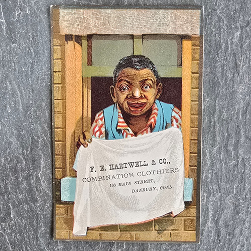 F.E. Hartwell & Co. Clothiers Danbury, CN Antique Victorian Trade Card Black Americana Woman in Window