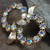 Vintage Coro Gold Tone Infinity Pin Wreath Brooch Aurora Borealis Rhinestones