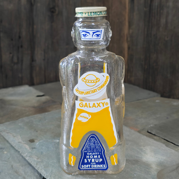 Vintage Galaxy Home Syrup Figural Interplanetary Commander Glass Bank Bottle