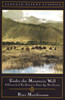 Under the Mountain Wall: A Chronicle of Two Seasons in Stone Age New Guinea - ISBN: 9780140252705
