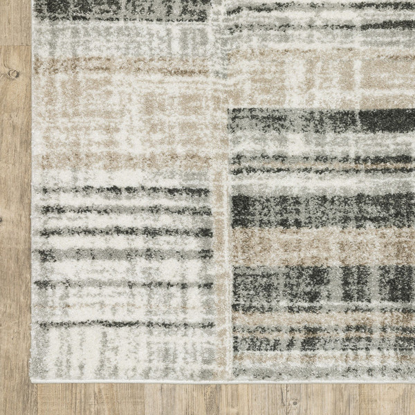 3' X 5' Grey Charcoal Ivory Tan Brown And Beige Geometric Power Loom Stain Resistant Area Rug