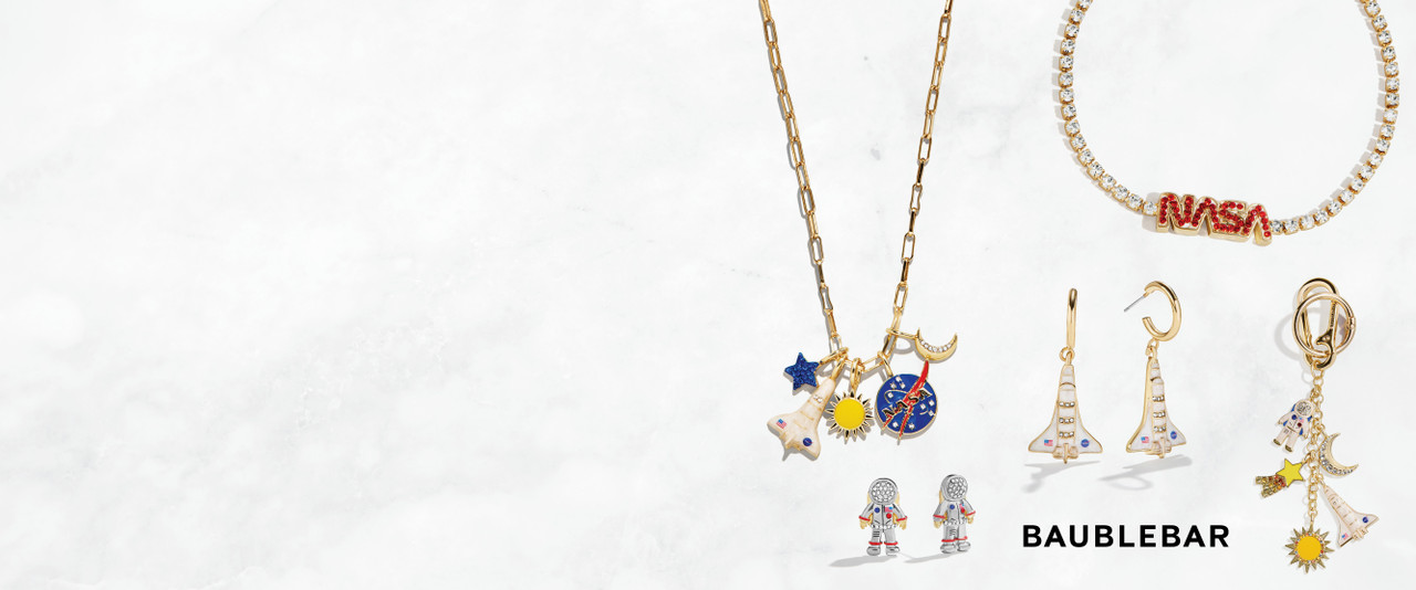 NASA x BaubleBar Jewelry on Marble Background