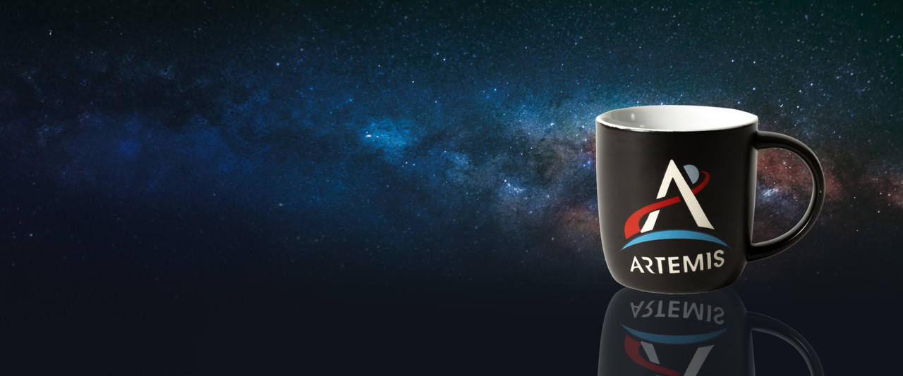 Black mug with Artemis logo on space background.