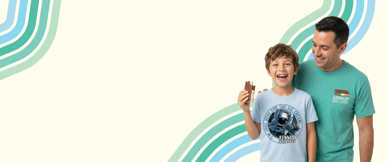 Boy and father with astronaut ice cream tees.