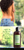 Bottle of the product with an image of a women's back Bottle of the product with an image of a women's back