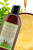 Bottle of the product with a background of the texture Bottle of the product with a background of the texture