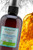 Bottle of the product and showing the products consistency in the back Bottle of the product and showing the products consistency in the back
