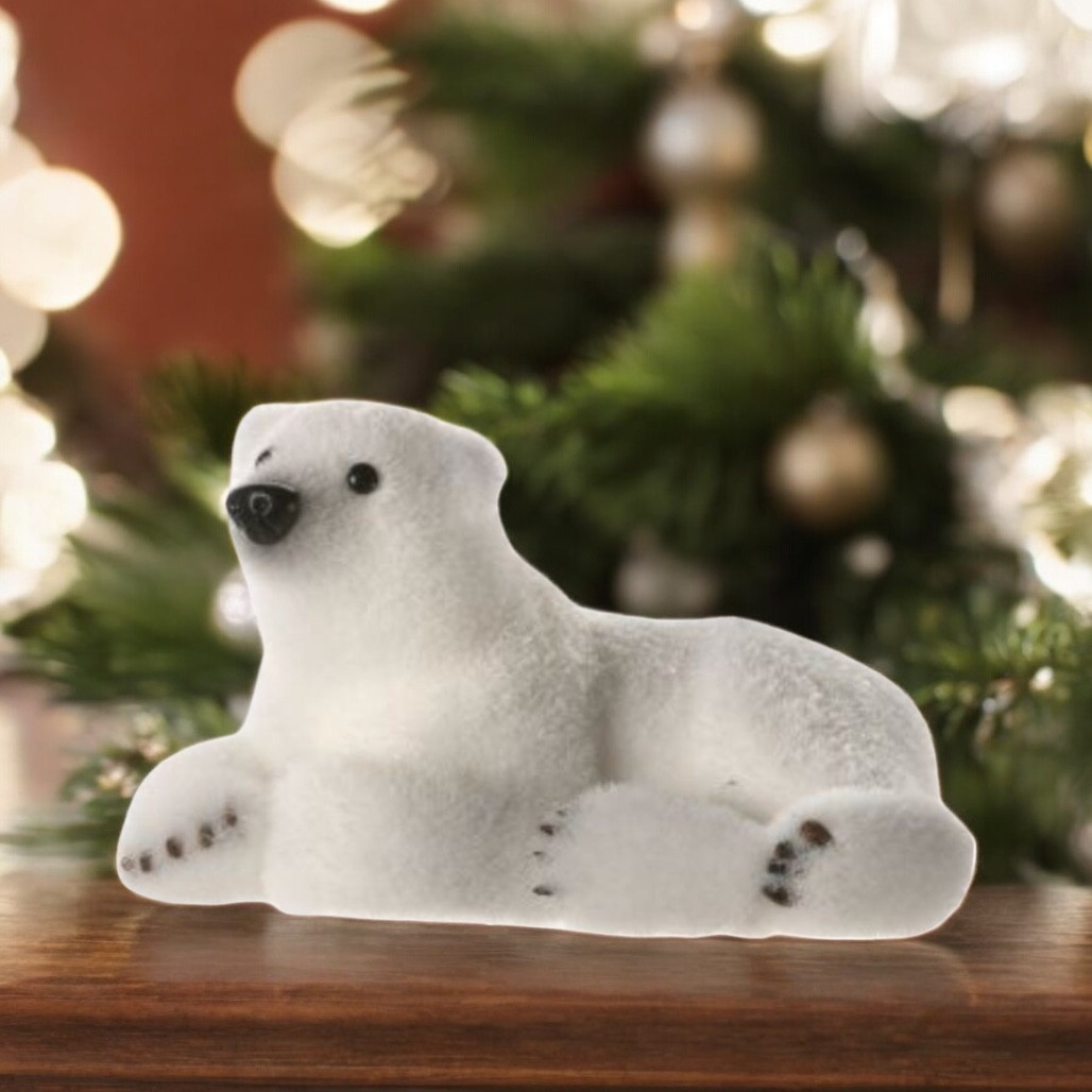 Polar Bear Cub Lying Figurine