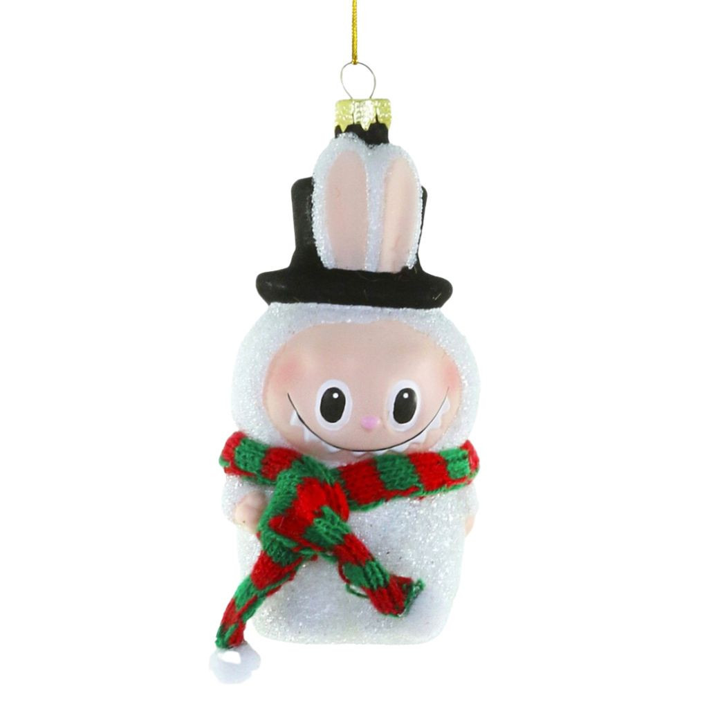 Glass Fuzzy Monster Snowman ornament with black top hat and red-and-green scarf.
White hanging character ornament with tall ears, smiling face, and snowy glitter finish.
Fuzzy Monster Snowman glass ornament, 2 x 1.5 x 4.5 inches.