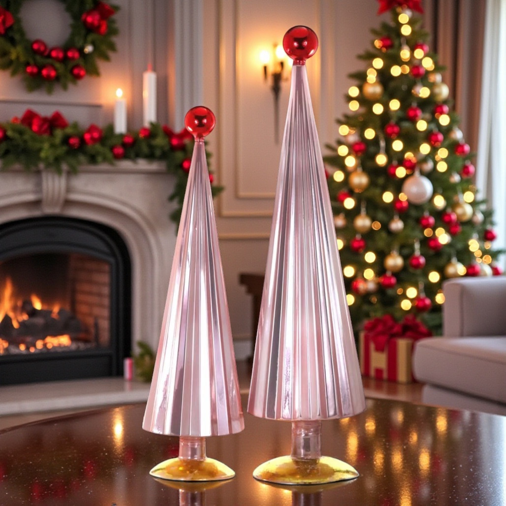 Set of two pink pleated glass Christmas trees with red ball toppers.
Large glossy cone-shaped glass trees with vertical ribbing and pedestal bases.
Decorative Pink Red glass tree set ranging from 18 to 21.75 inches.