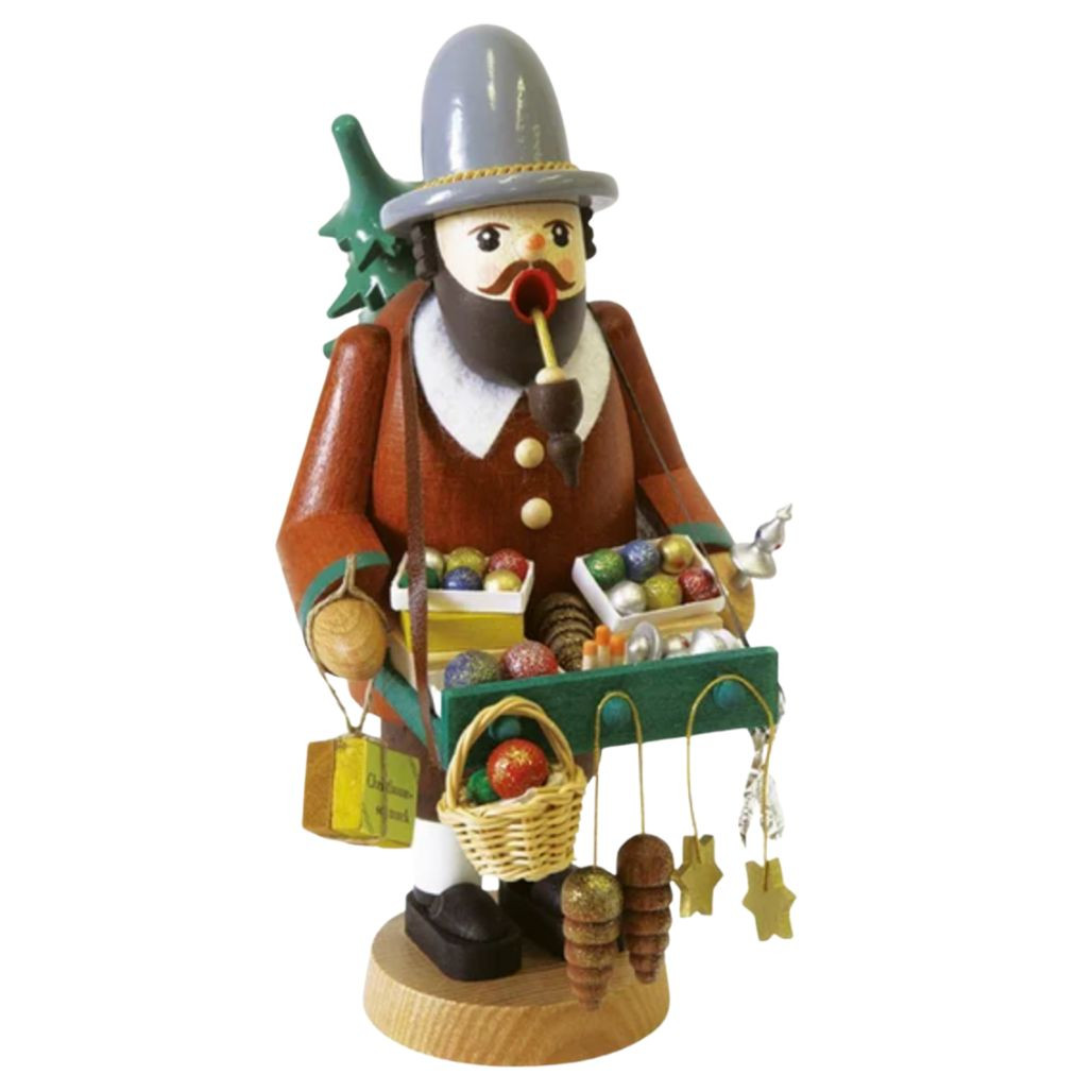 Wooden German incense burner figure dressed as an ornament vendor.
Richard Glaesser smoker holding colorful ornaments and hanging decorations.
7.5-inch wood Christmas ornament vendor smoker on round base.