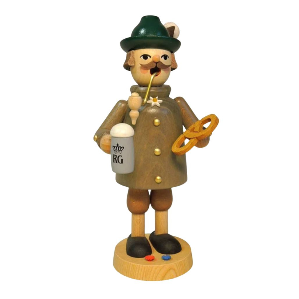 Wooden Bavarian incense burner figure holding a mug and pretzel.
Richard Glaesser smoker with green hat, tan coat, and round base.
7.25-inch wood German Christmas smoker made in Germany.