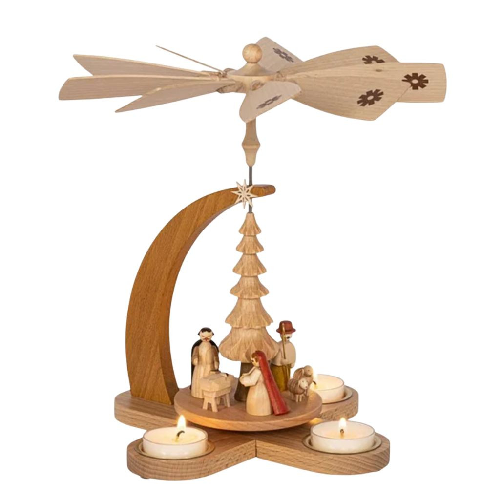 Natural wood Christmas pyramid with Nativity scene and tealight holders.
Richard Glaesser German pyramid with Holy Family, tree, shepherds, and fan.
11-inch wooden tealight pyramid made in Germany.