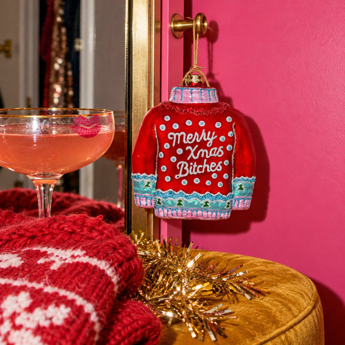 Cody Foster Red Christmas Sweater Bitches Blown Glass Ornament – glass Christmas ornament styled in a fun, eclectic home scene