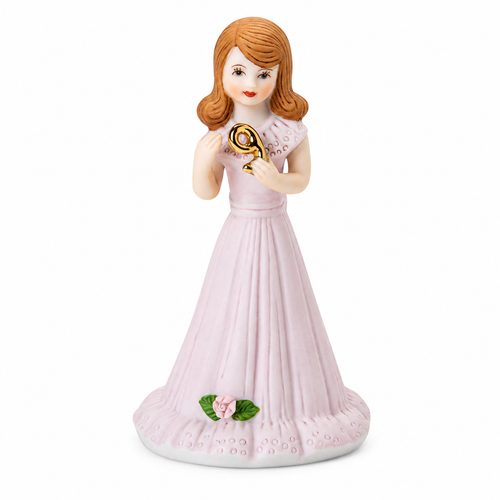 Front view of Growing Up Girls Brunette Age 9 porcelain bisque figurine in a powder pink dress holding a raised gold number 9.
Rear view showing the powder pink dress with back bow detail and flowing brunette hair.
5-inch collectible birthday figurine featuring a brunette girl with floral accents and a golden number 9.