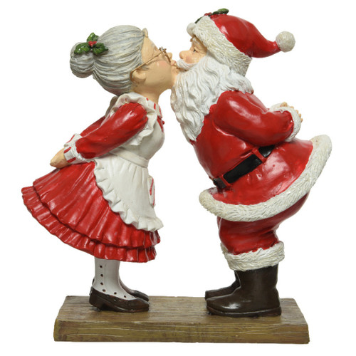 Santa And Mrs. Claus Kissing Figurine