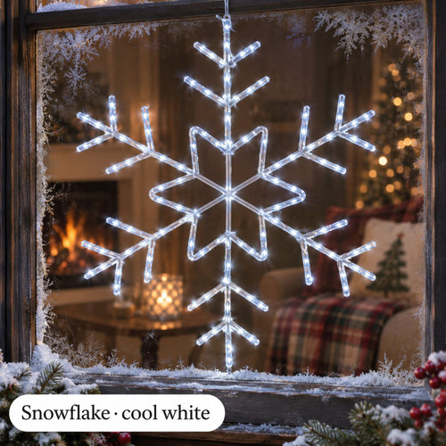 125 LED Cool White Snowflake, 23.6in Diameter, Indoor/Outdoor, Battery Operated - warm LED lights on a decorated Christmas tree with a close-up of the bulbs