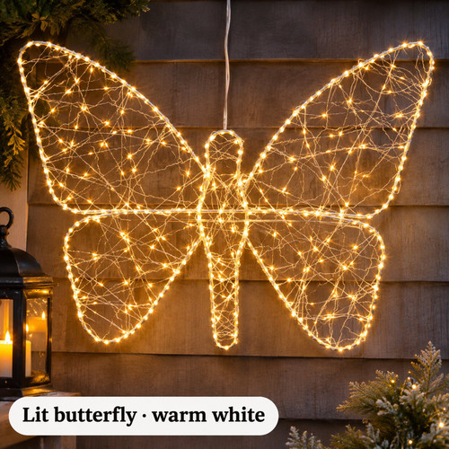 Lumineo Micro LED Lighted Butterfly - warm LED lights on a decorated Christmas tree with a close-up of the bulbs