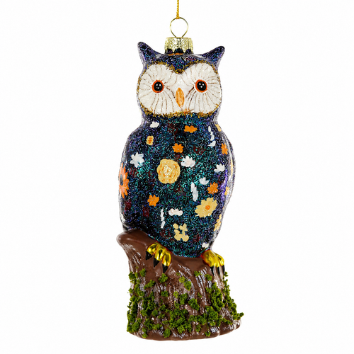 Glass owl ornament with dark glittered body, floral accents, and woodland perch.
Grande Forest Owl hanging Christmas ornament with bright eyes and mossy base.
Colorful forest owl glass ornament measuring 2.5 x 2 x 5 inches.