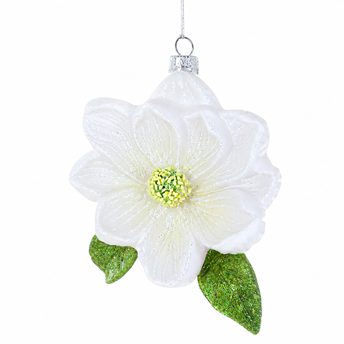 Glass Southern magnolia ornament with white petals and green glitter leaves.
Floral hanging ornament with textured yellow-green center and soft sparkle.
4 inch glass magnolia Christmas ornament on a white background.