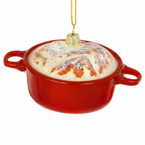 Glass Dutch oven bread ornament with red pot and crusty loaf inside.
Kitchen-themed hanging ornament showing baked bread in a red handled pan.
4.25 inch Dutch Oven Bread glass ornament on a white background.