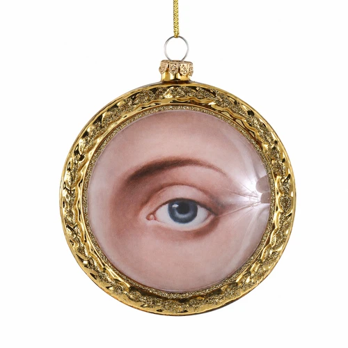 Glass ornament with framed eye portrait inside an ornate gold round frame.
Vintage-inspired hanging ornament with blue eye image and glittered gold border.
3.75 inch Framed Lovers Eye Small glass ornament on a white background.