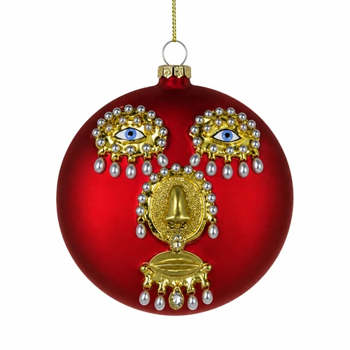 Red glass disc Christmas ornament with stylized face design, gold details, and pearl-like accents.
Flat red ornament with blue eyes, gold facial features, pearl-style drops, and hanging cord.
3.5 inch glass face disc ornament in red with decorative pearl-style trim.